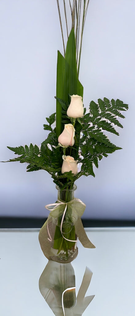 3 Roses in a glass Vase