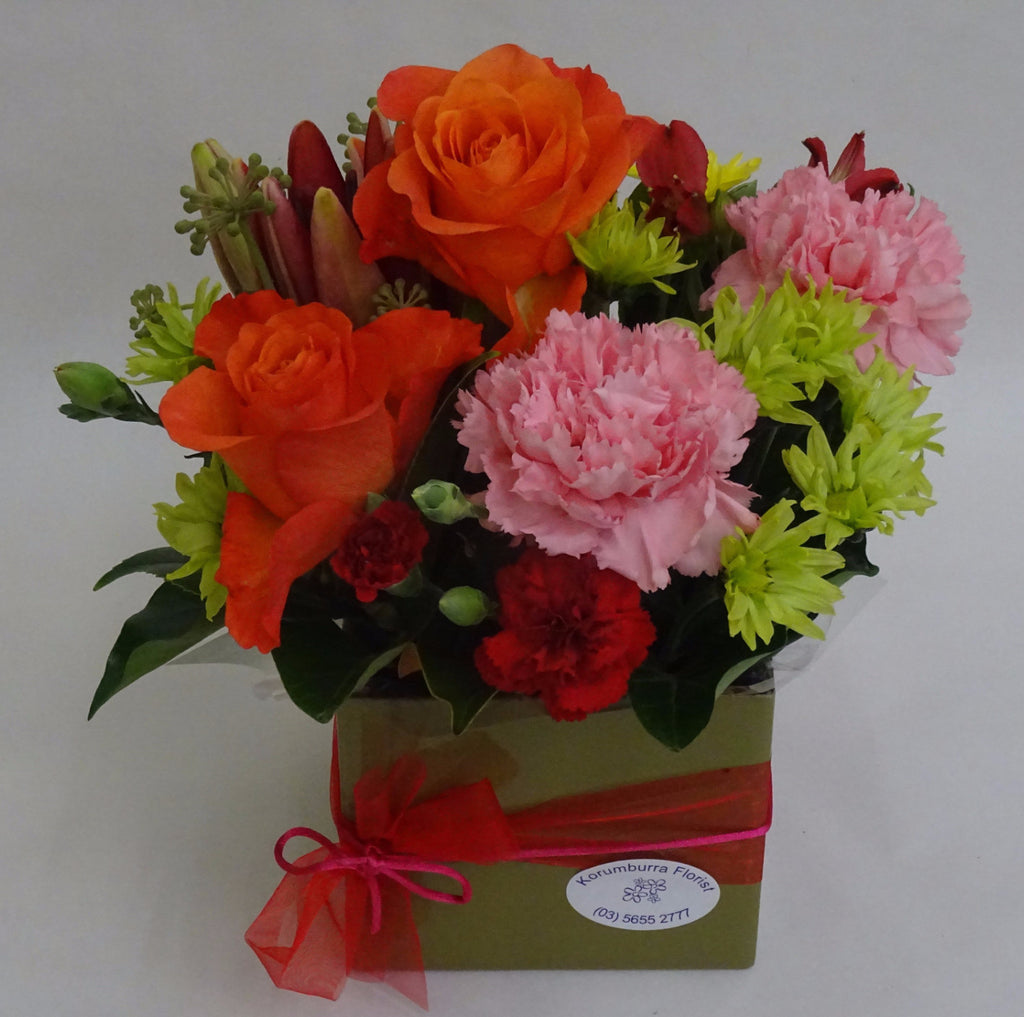 Floral arrangement with roses and carnations - any occasion